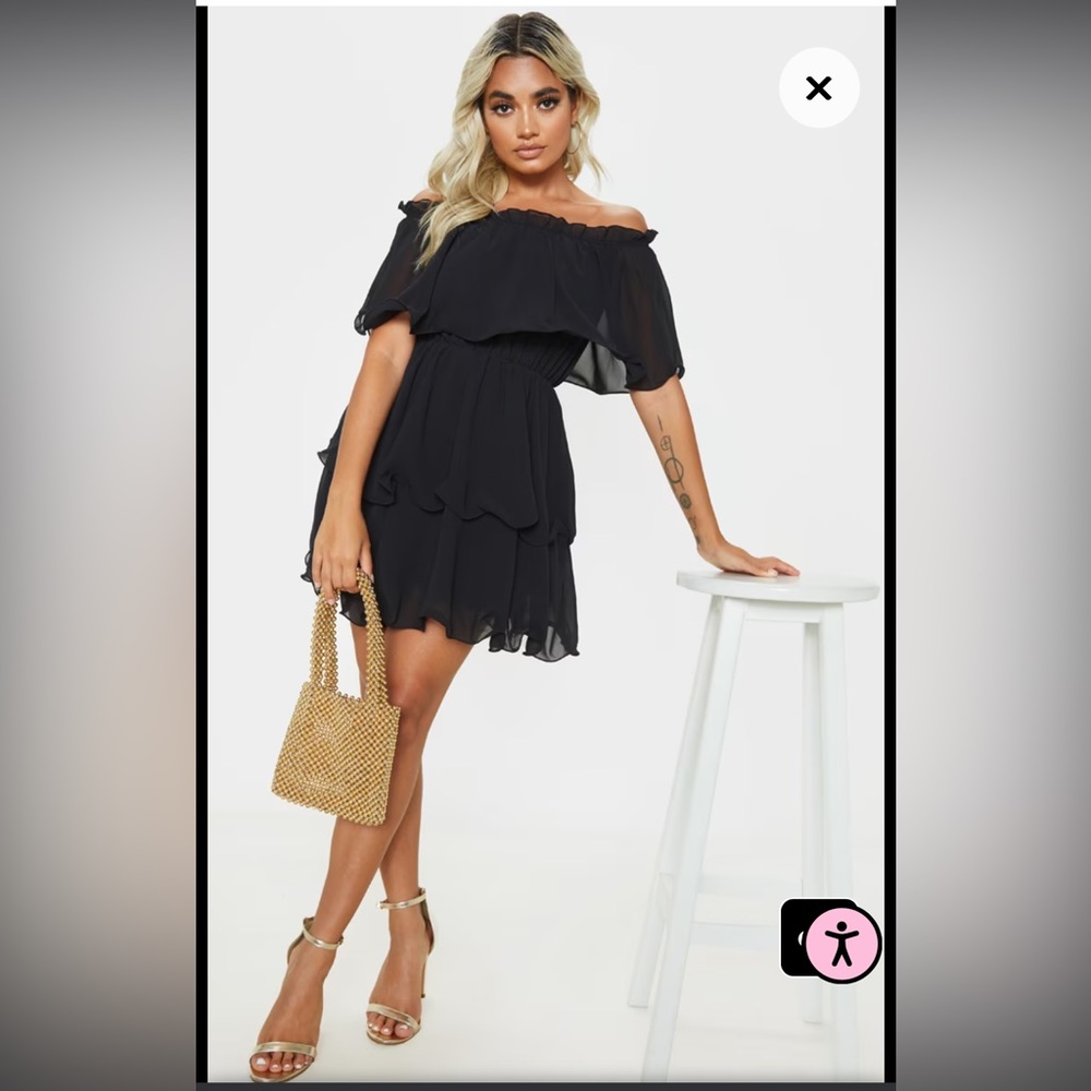 Pretty Little Things black ruffle dress